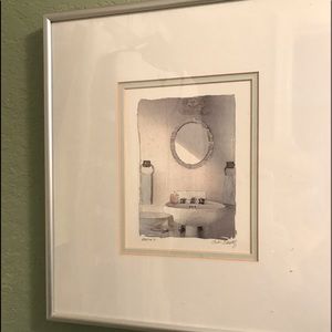 Small bathroom sink picture, pastel colors.